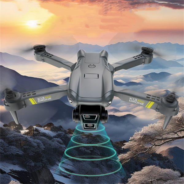 TheK13 Smart Camera Drone With 2 Batteries Features Real-time Image Transmission From A Single Camera. It Has One-click Touch And Landing Functions. This Is A Foldable Remote-controlled Drone Toy, Ma - Image 3